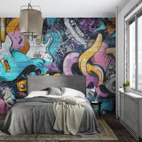 Music graffiti wallpaper bringing urban style to a modern teen bedroom with electric guitars and vibrant colors
