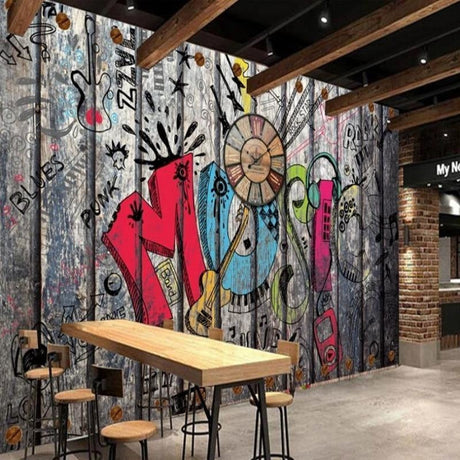 Music graffiti wallpaper bringing urban style to a modern teen bedroom with bright wall lighting