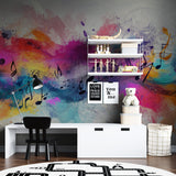 Creative space with musical wallpaper showing floating notes and color splashes