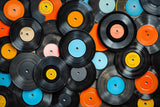 Design file showing detailed vinyl record pattern with vibrant label colors and authentic textures