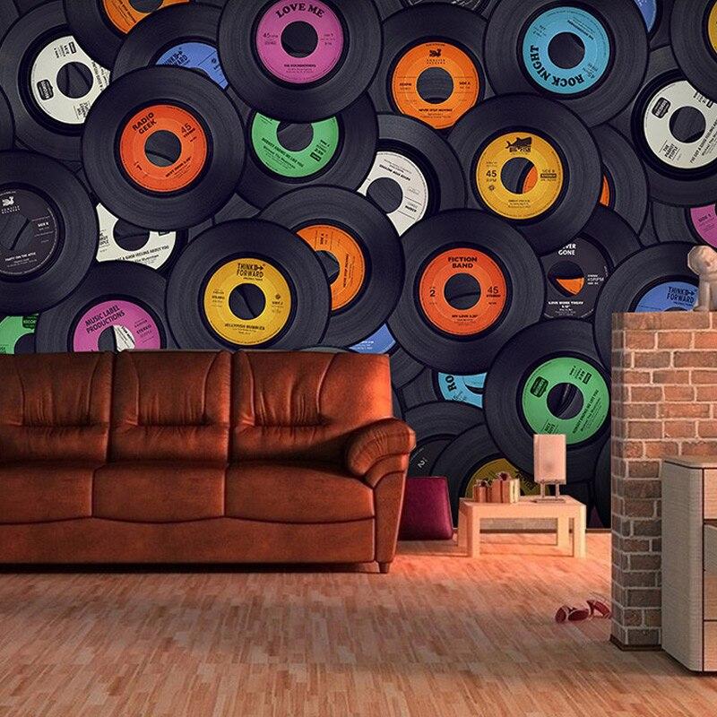 Vinyl record wallpaper creating a bold statement wall in modern living room with turntable and leather sofa