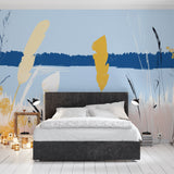 Lake wallpaper mural creating a serene atmosphere in a modern living room, soft golden reeds reflecting on calm waters