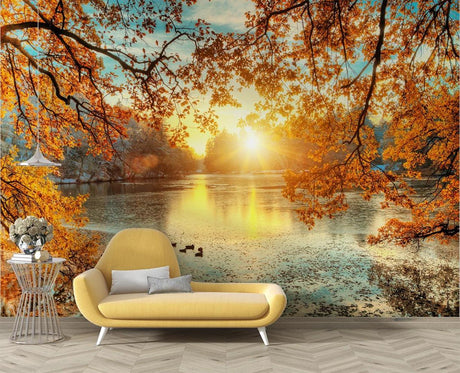 Autumn lake sunset wallpaper mural in a modern living room creating a peaceful atmosphere with golden light reflections