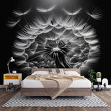 Black and white dandelion wall mural creating drama in a minimalist living room with modern furniture