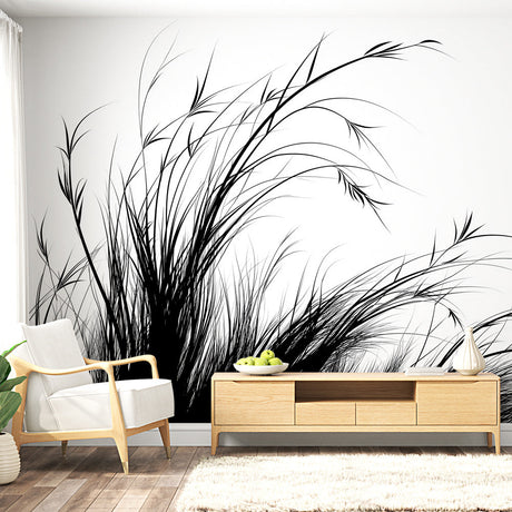 Black and white grass wallpaper mural displayed in a bright modern living room, creating a striking focal wall