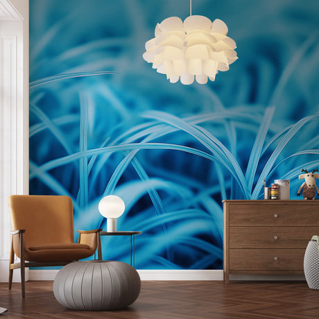 Blue grass abstract wallpaper mural shown in a modern minimalist living room, creating a peaceful atmosphere