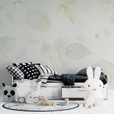 Nature-inspired leaves wallpaper in home office showing calm work environment