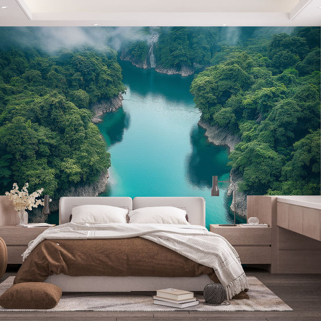 Turquoise river landscape wallpaper creating depth in modern living room with natural light and minimal furniture