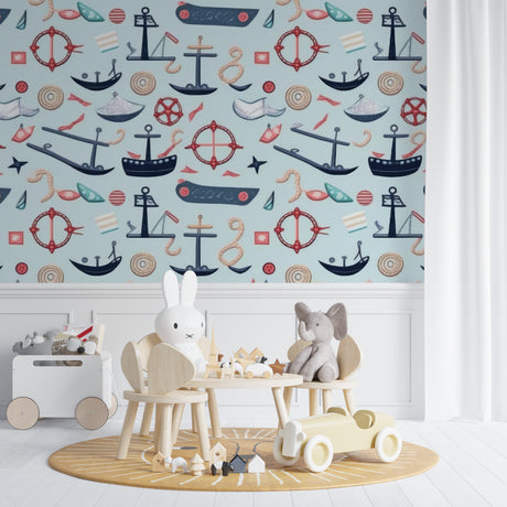 Nautical wallpaper in bright kids bedroom with white furniture showing playful ships and compass design