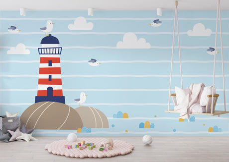 Nautical lighthouse wallpaper creating a cozy atmosphere in a bright kids bedroom with white furniture
