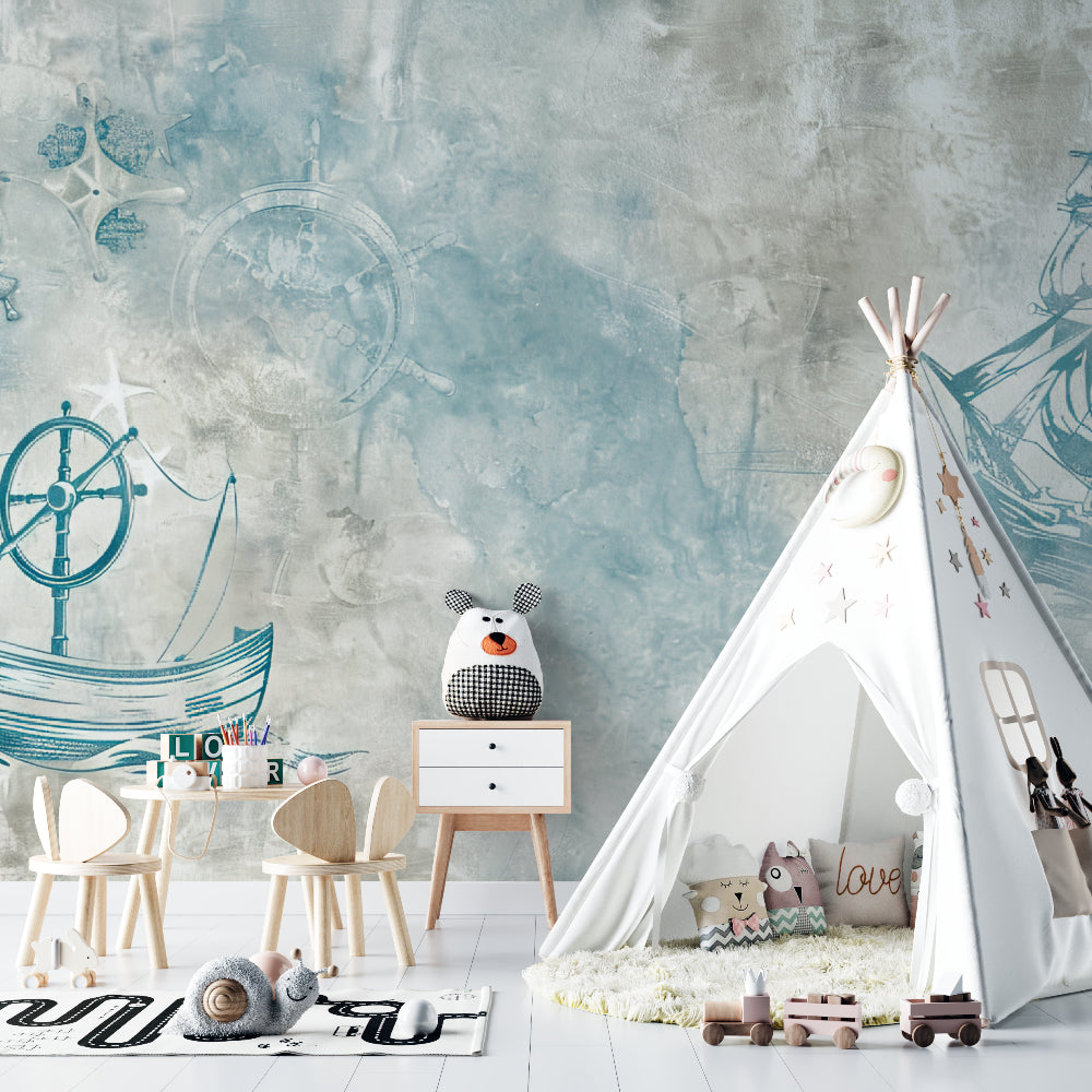 Ships and compass wallpaper creating a dreamy atmosphere in a reading nook