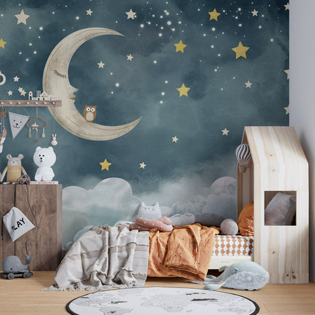 Night sky wallpaper in cozy nursery with soft lighting showing moon and stars design