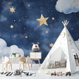 Night sky wallpaper creating a cozy atmosphere in a modern nursery with soft lighting
