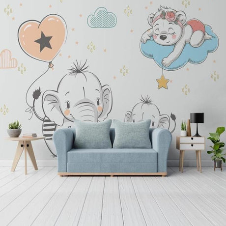 Nursery animal wallpaper with elephants and bears shown in a bright modern nursery with white furniture