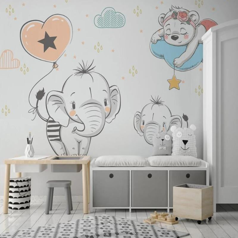 Baby room elephant wallpaper displayed in a cozy reading nook with rocking chair and soft lighting