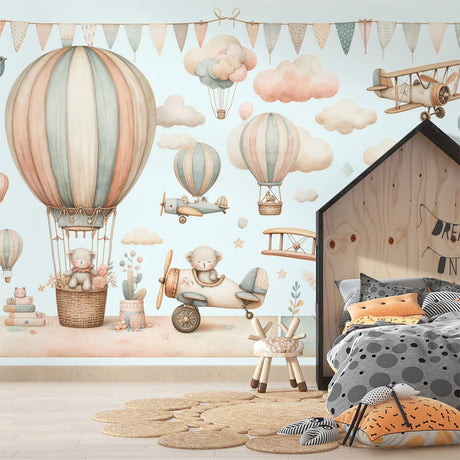 Hot air balloon nursery wallpaper creating a cozy atmosphere in a soft-lit baby room with white furniture