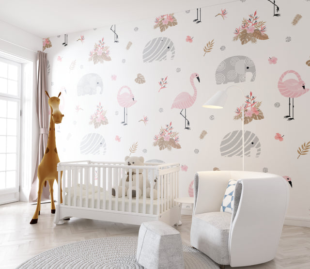 Pink flamingo and elephant nursery wallpaper in a modern white nursery with natural wood furniture