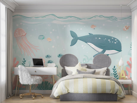 Ocean animals wallpaper displayed in a bright nursery with soft lighting and wooden furniture