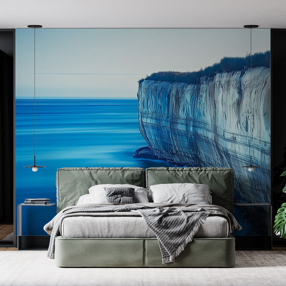 Ocean cliff wallpaper creating depth in a modern living room with natural light highlighting the coastal landscape