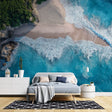 Ocean wave wallpaper creating a stunning focal point in modern living room with white furniture and natural light