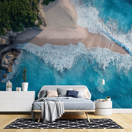 Ocean wave wallpaper creating a stunning focal point in modern living room with white furniture and natural light