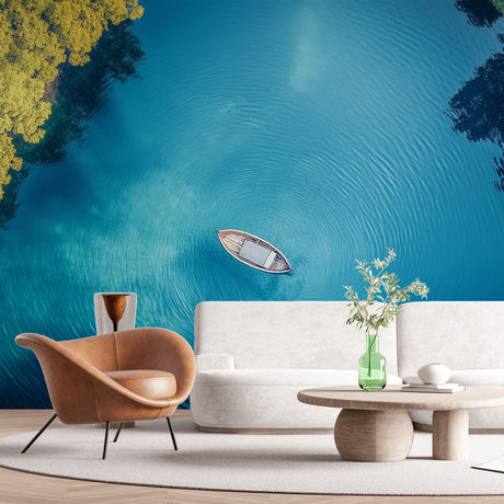 Turquoise ocean view wallpaper creating depth in a modern living room with natural light highlighting the aerial perspective