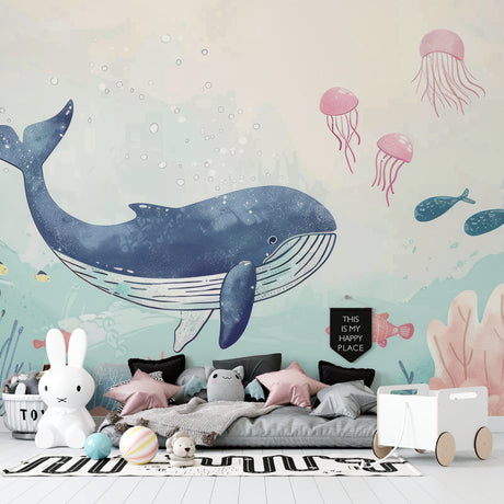 Ocean theme wallpaper creating a peaceful nursery atmosphere with gentle whale and jellyfish design