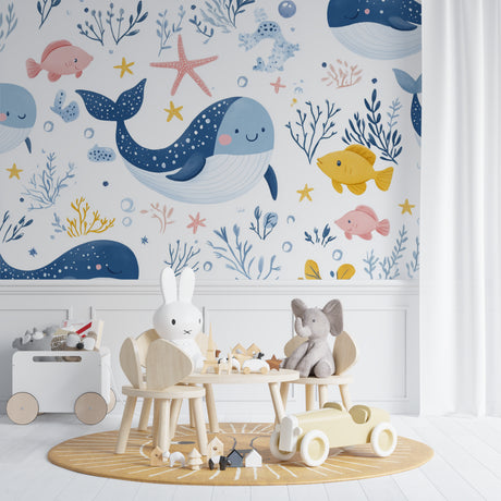 Ocean themed wallpaper brings underwater adventure to a bright nursery with playful marine animals