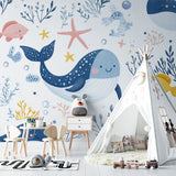 Reading nook with marine animals wallpaper showing playful underwater scene
