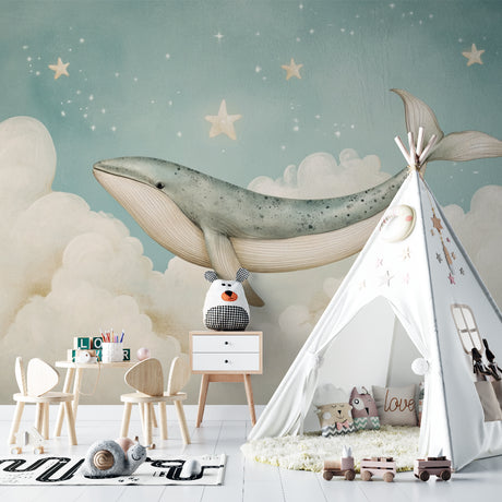 Whale nursery wallpaper creating a magical atmosphere in a modern nursery with soft mint walls and wooden furniture