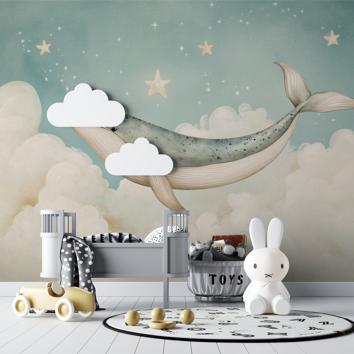 Ocean themed wallpaper transforming a kids bedroom with floating whale and golden stars