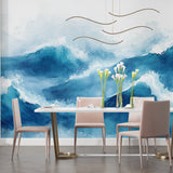 Blue watercolor wave mural brightening coastal style bedroom