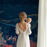 Marine life wallpaper showcased in a cozy reading nook with soft lighting