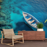 Mediterranean sea wallpaper creating a bright, airy atmosphere in a modern living room with coastal decor