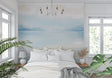 Ocean horizon wallpaper creating a peaceful atmosphere in a modern living room with natural light