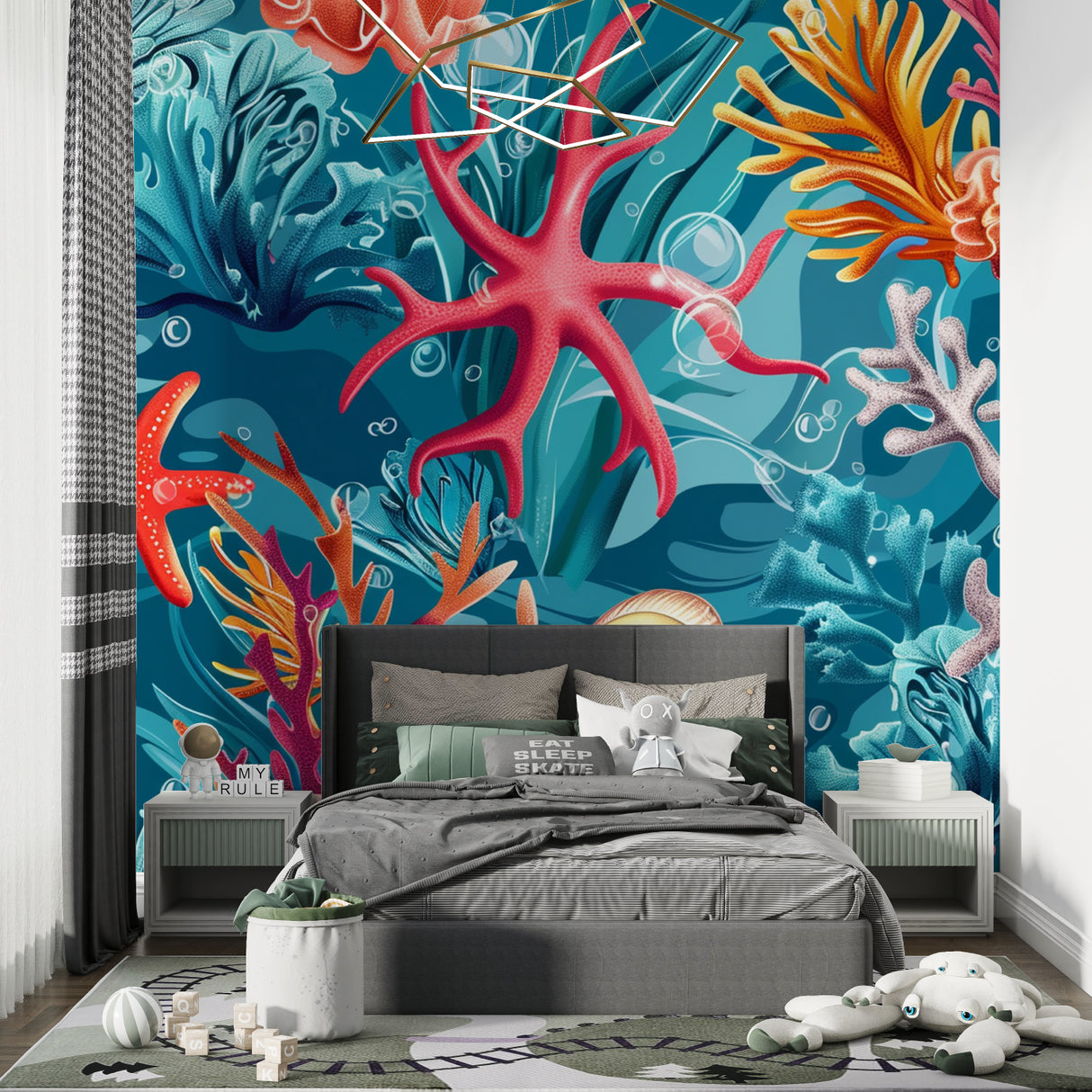 Ocean coral reef wallpaper in bright modern living room showing vibrant pink starfish and turquoise water details