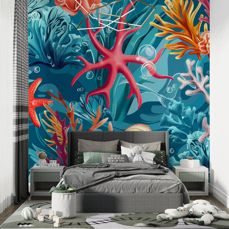 Ocean coral reef wallpaper in bright modern living room showing vibrant pink starfish and turquoise water details