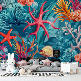 Coral reef wallpaper creating underwater atmosphere in playroom setting