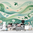 Ocean life wallpaper creating a serene underwater atmosphere in a modern living room, with soft watercolor marine creatures