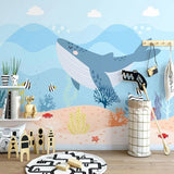 Marine life wallpaper displayed in bright kids bedroom with reading nook