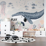 Whale wall mural creating a peaceful atmosphere in a kids bedroom