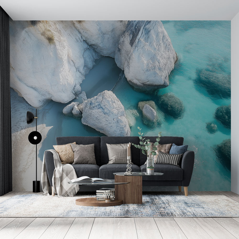 Coastal landscape wallpaper with white cliffs and turquoise waters creating a bright, airy atmosphere in a modern living room