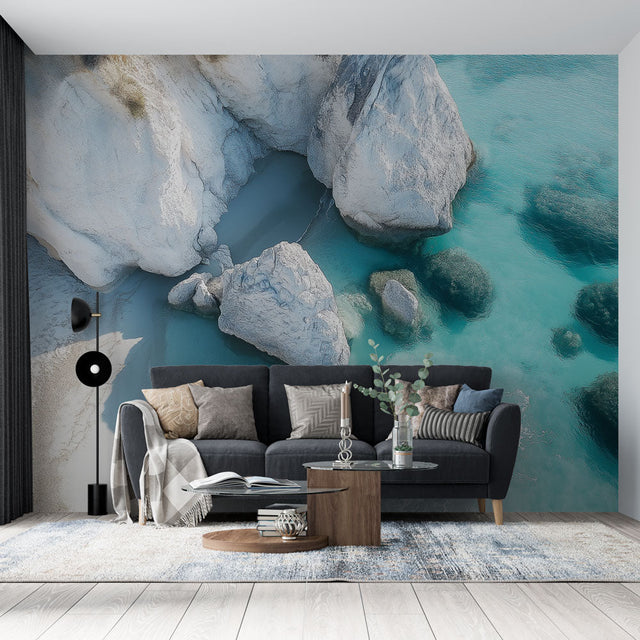 Coastal landscape wallpaper with white cliffs and turquoise waters creating a bright, airy atmosphere in a modern living room