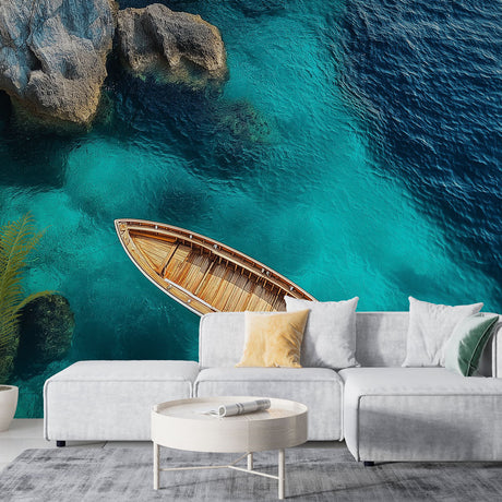 Ocean wallpaper with wooden boat creating a peaceful atmosphere in a modern living room with natural light