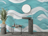 Ocean wave wallpaper creating a serene atmosphere in a modern living room with white furniture