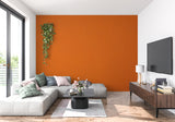 Orange wallpaper installation in hallway showing texture detail