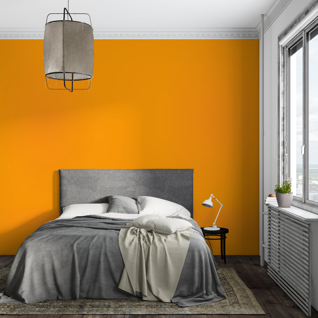Modern bedroom with orange accent wall mural showing perfect color balance