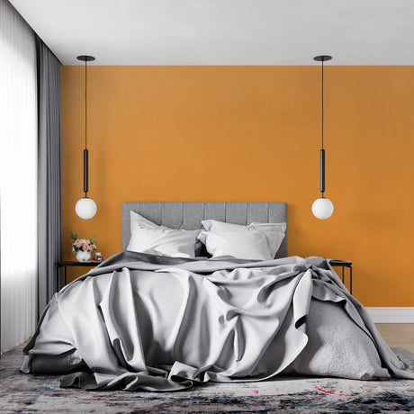 Modern orange accent wall mural in bright living room with minimalist furniture