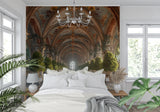Architectural trompe l'oeil wallpaper transforming a dining room into a palace corridor
