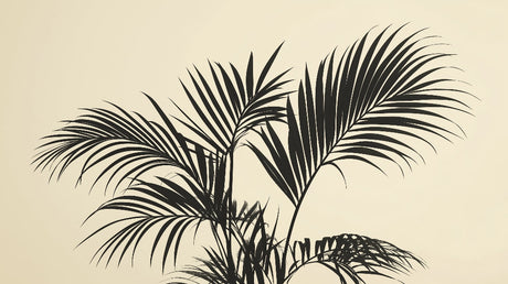 Black palm leaf silhouettes on beige background design file showing detailed botanical pattern